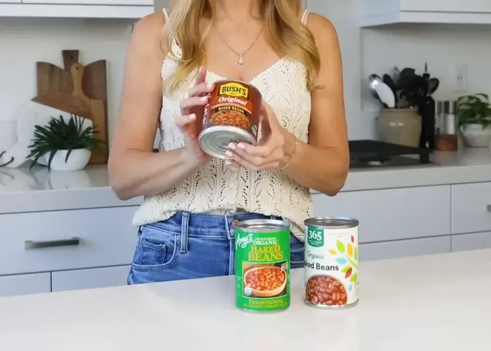 Choosing baked beans from different brands.