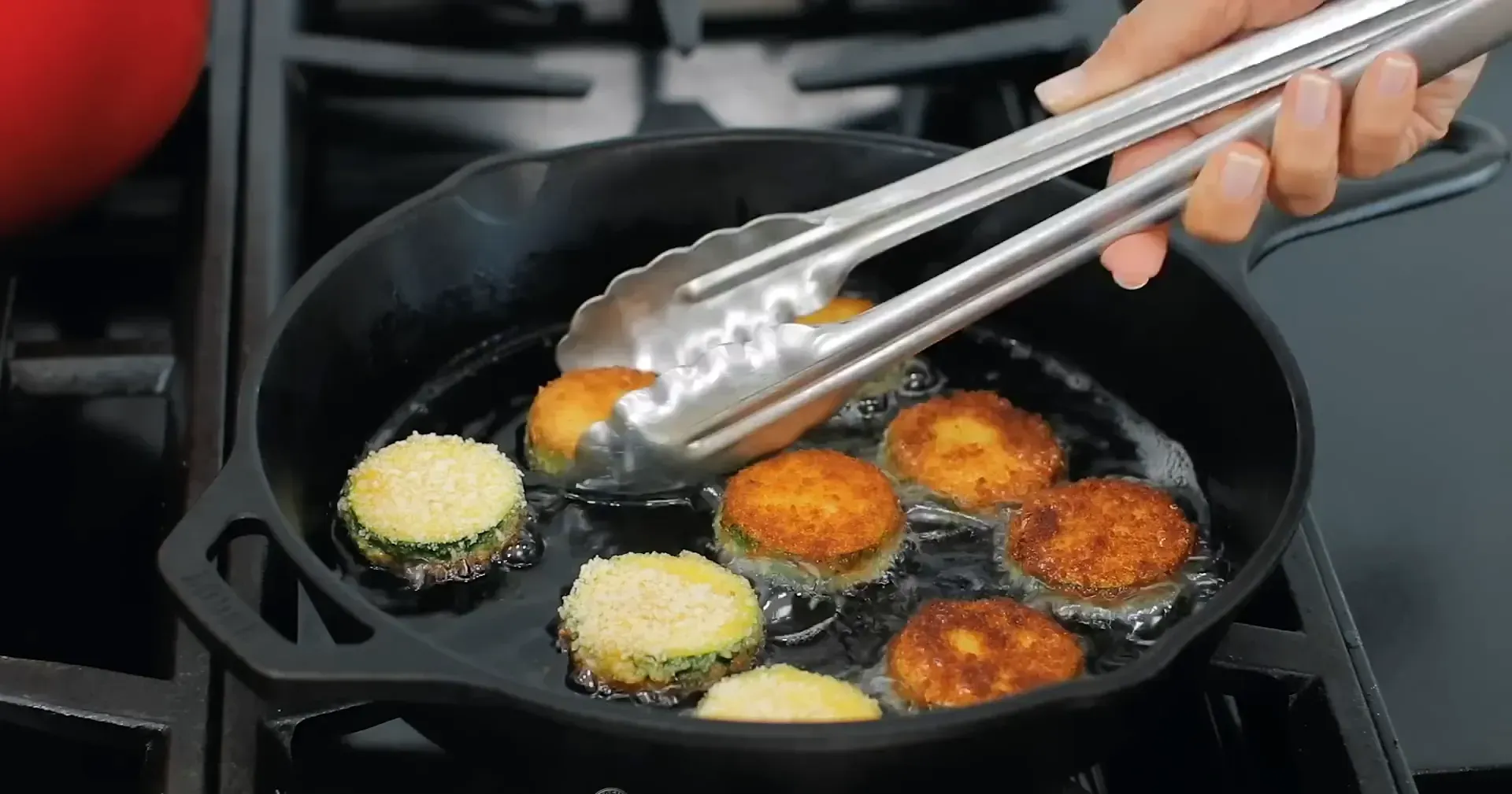 Placing cooked zucchini on a rack.