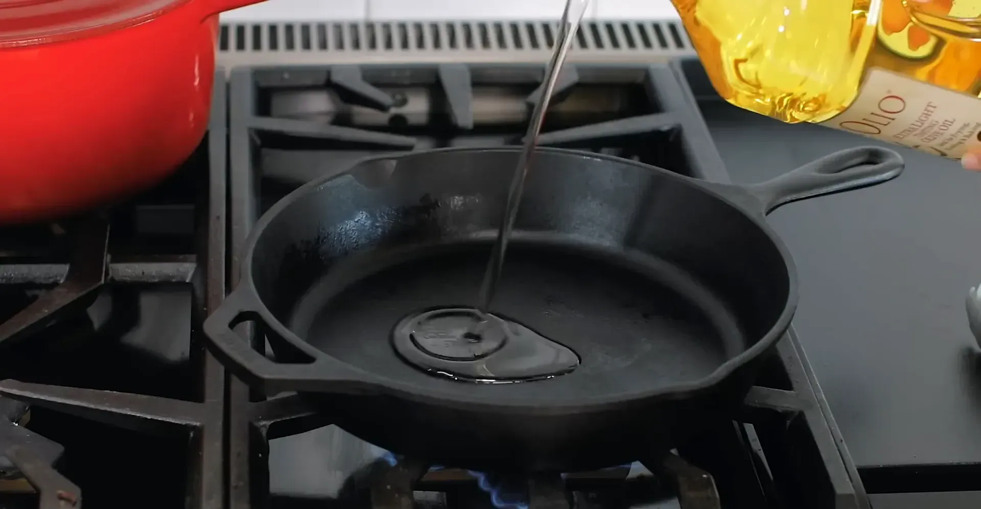 Heating oil in a skillet.