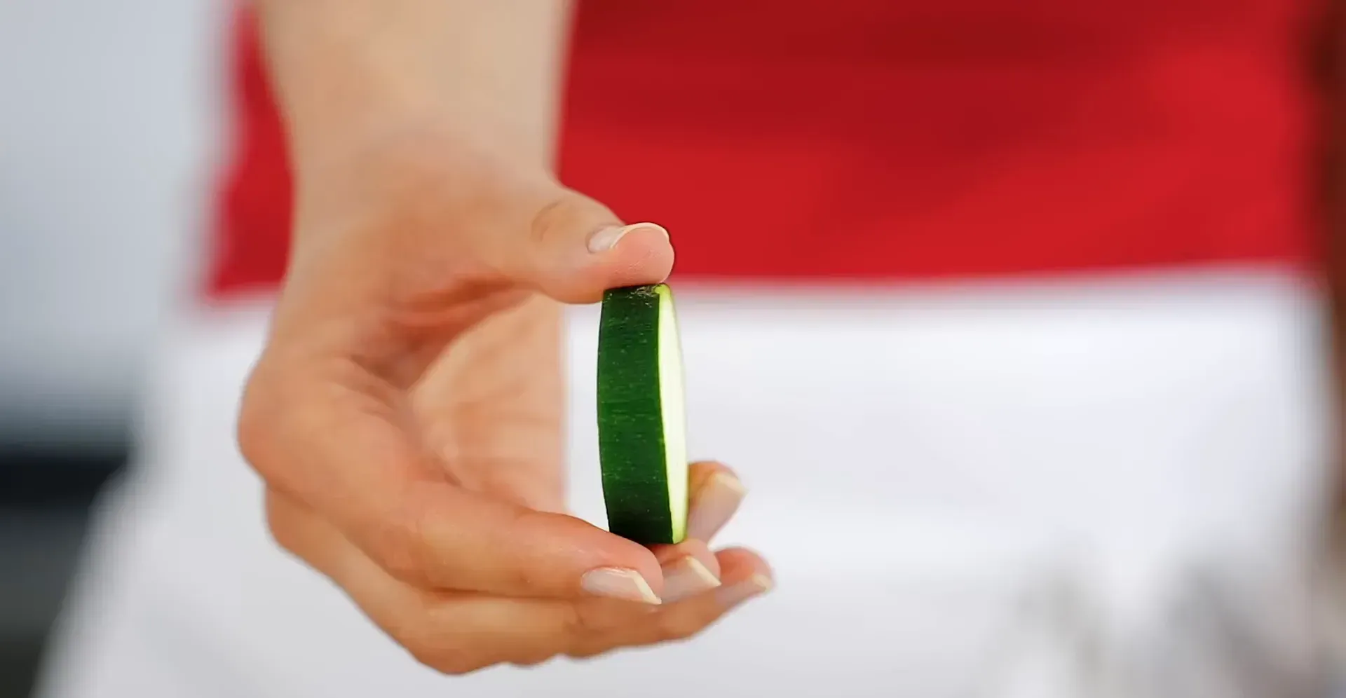 Slicing zucchini into rounds.