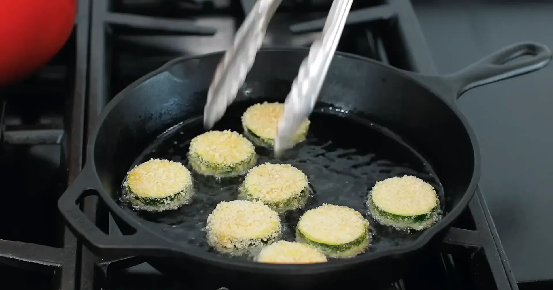 Cooking zucchini in hot oil.