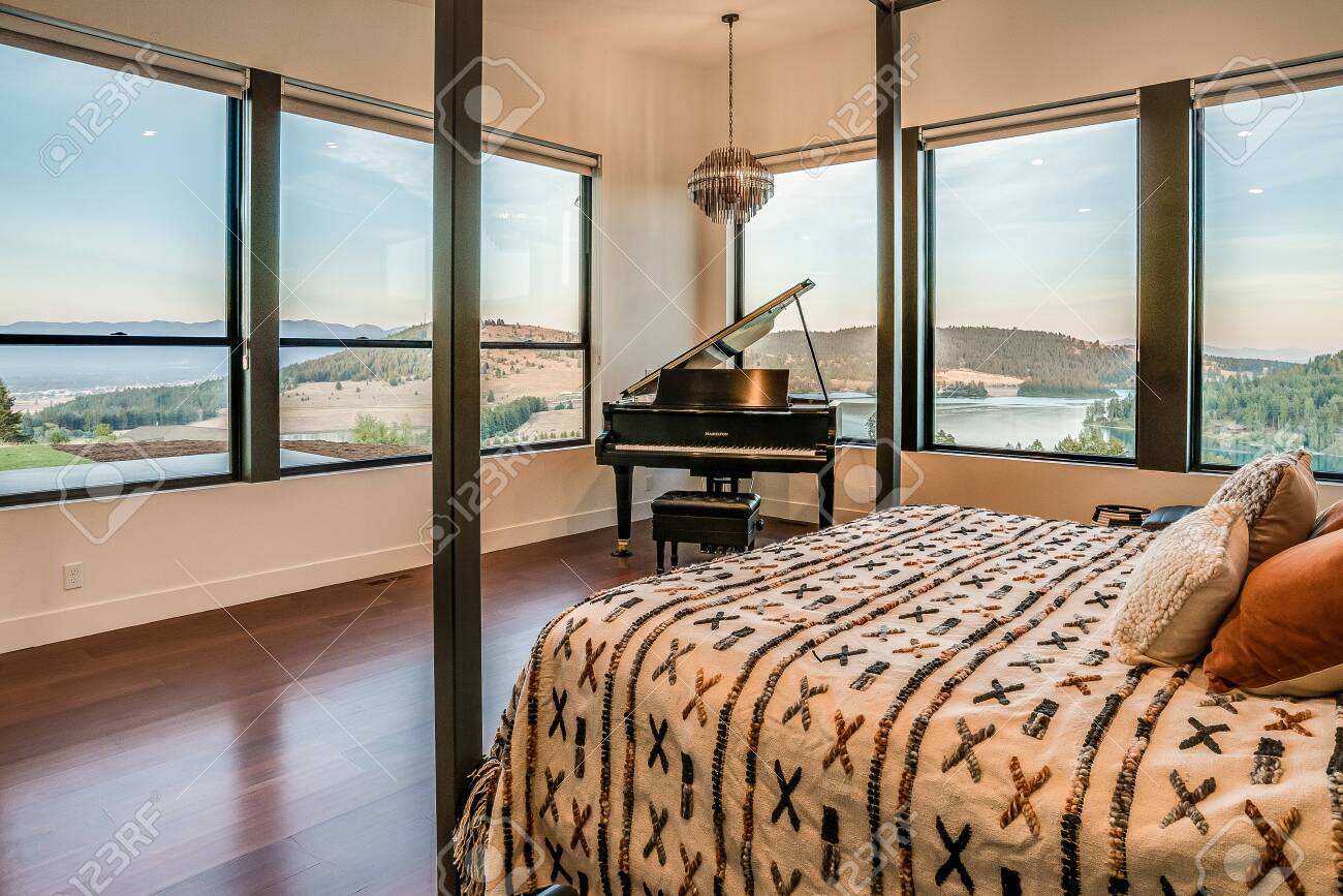 Large bedroom with grand piano corner