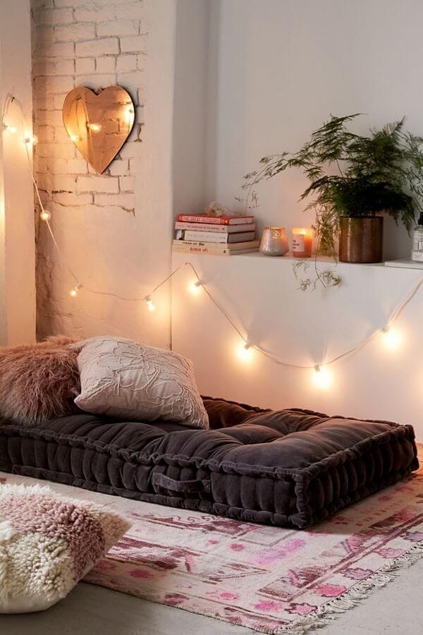 Cozy bedroom with meditation pillows
