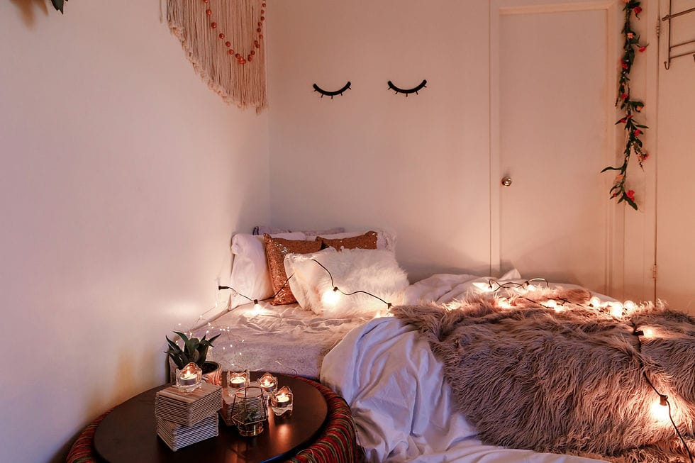 Cozy bedroom with ambient sconces