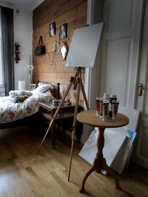 Large bedroom with painting easel corner