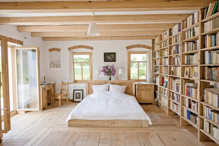 Large bedroom with private library wall