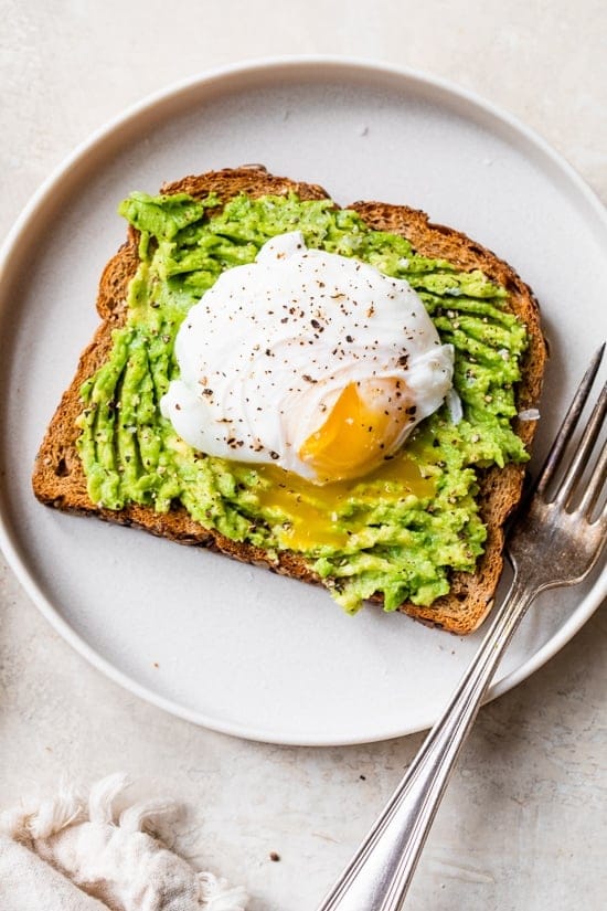 Whole Grain Toast with Smashed Avocado and Eggs