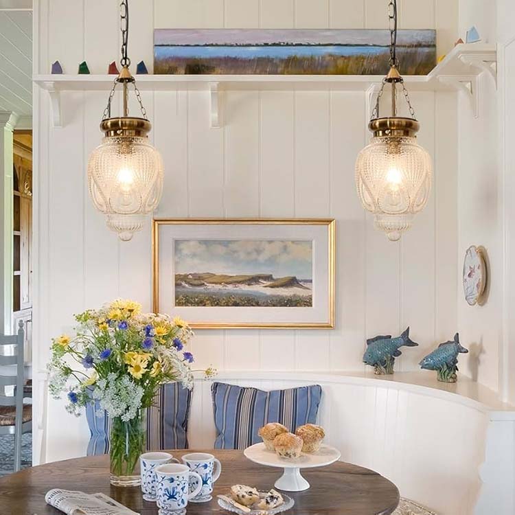 Incorporate brass pendant lights in your master bedroom