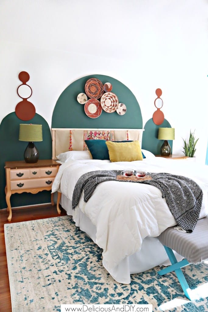 Bedroom wall with painted arch design