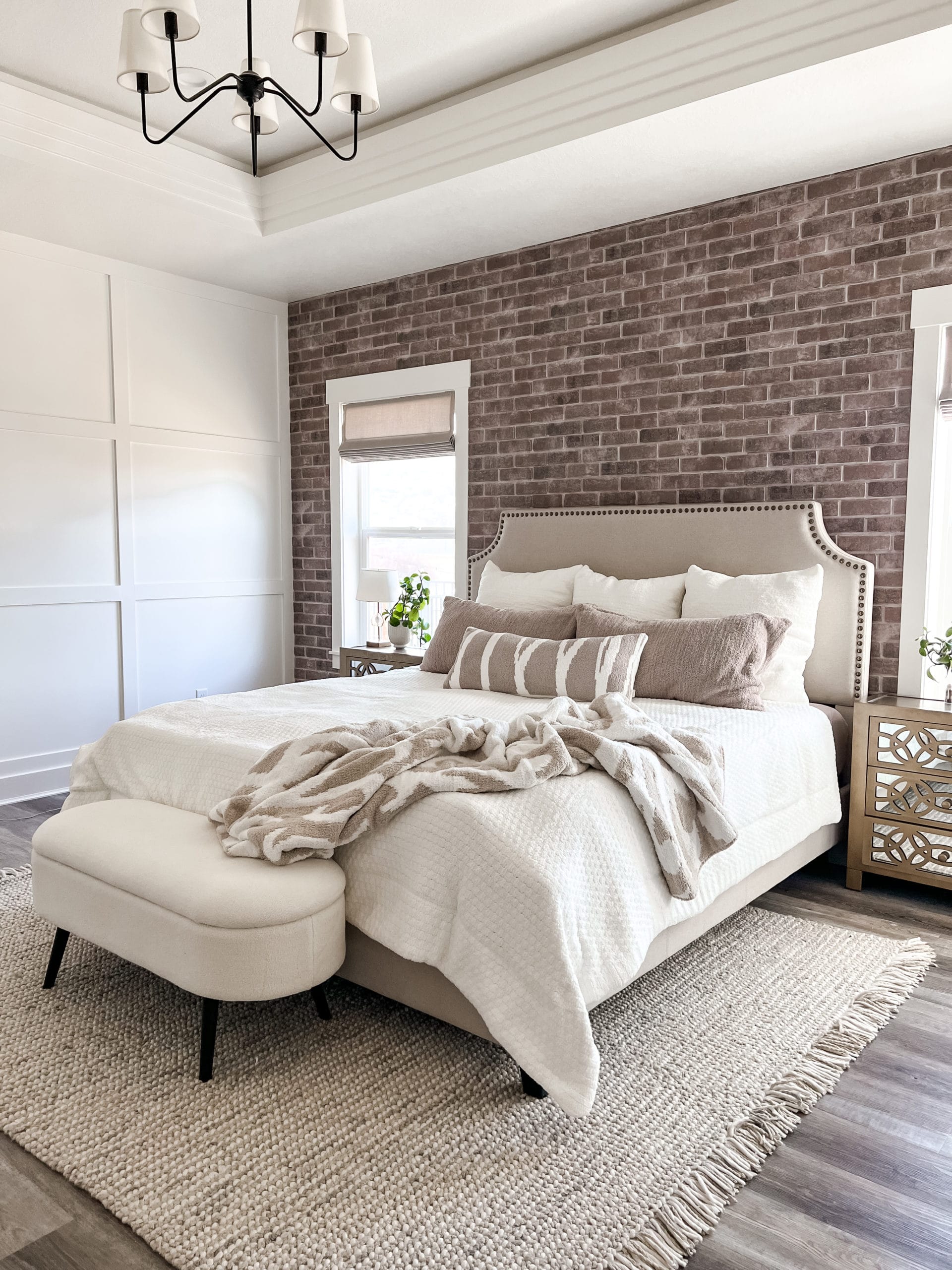 Bedroom wall with brick veneer accent