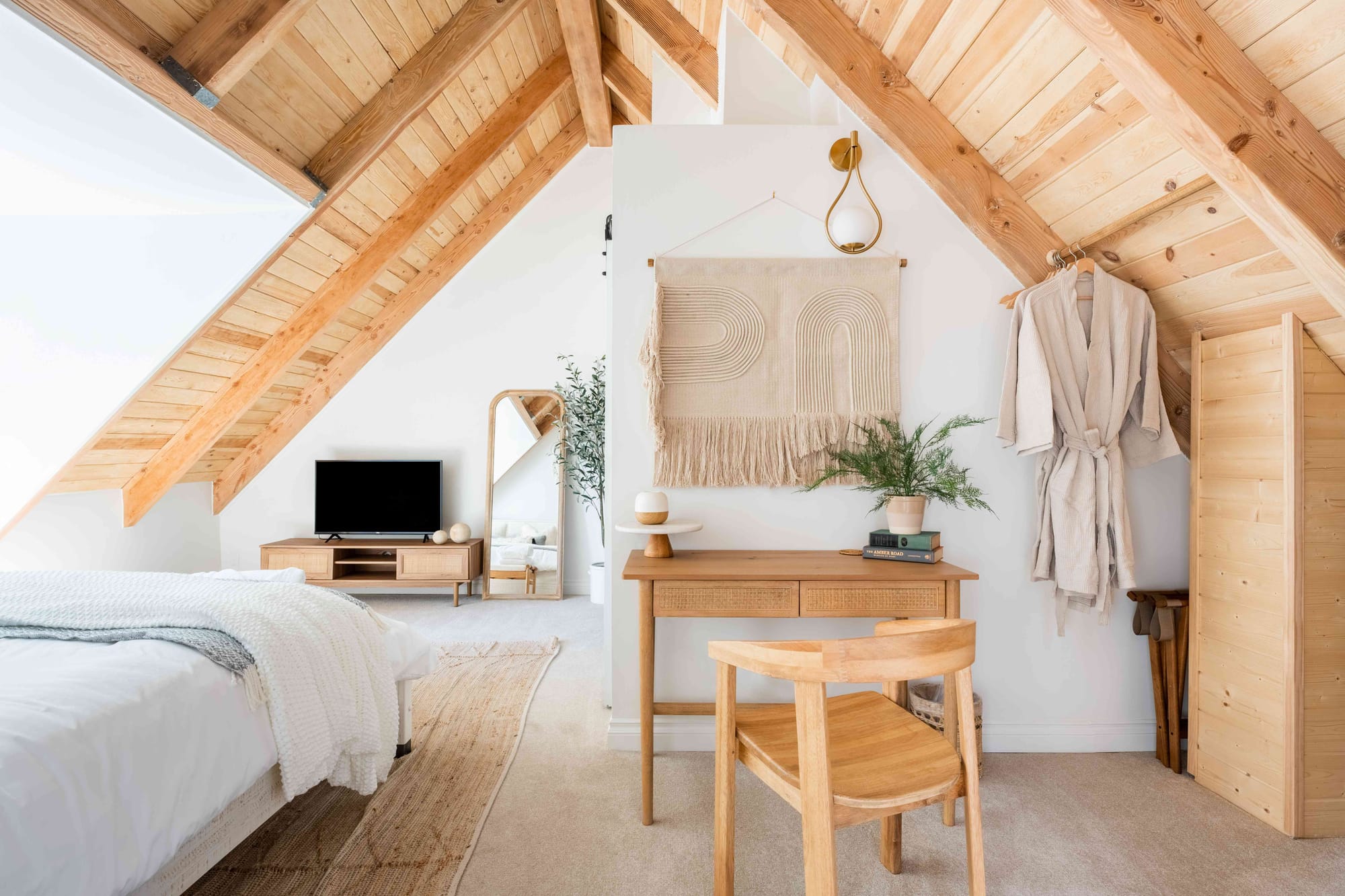 Large bedroom with dual desk workspace