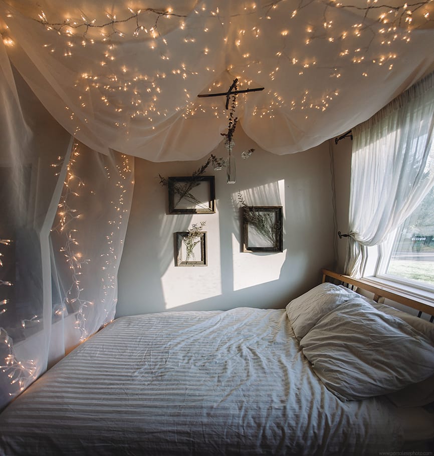 Cozy bedroom with twinkle light canopy