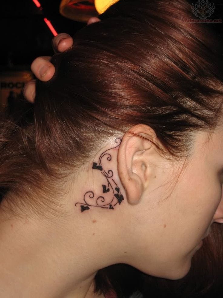 hidden behind ear ivy tattoo