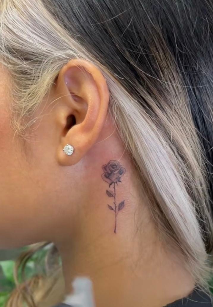 small neck rose tattoo