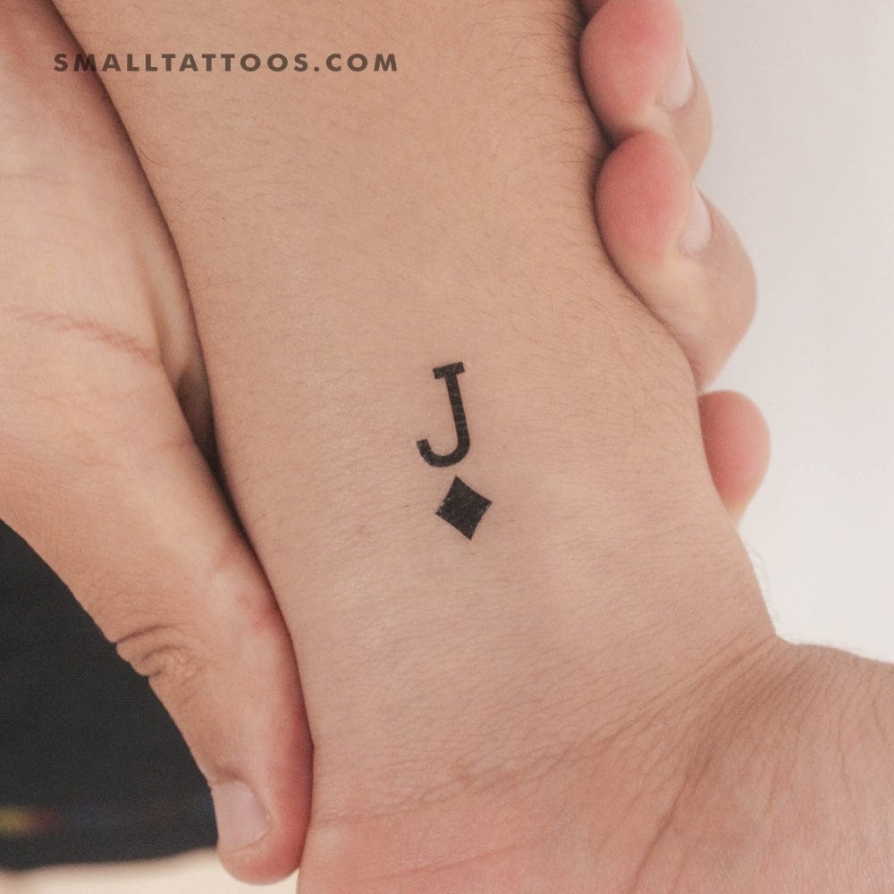 geometric shape j tattoo