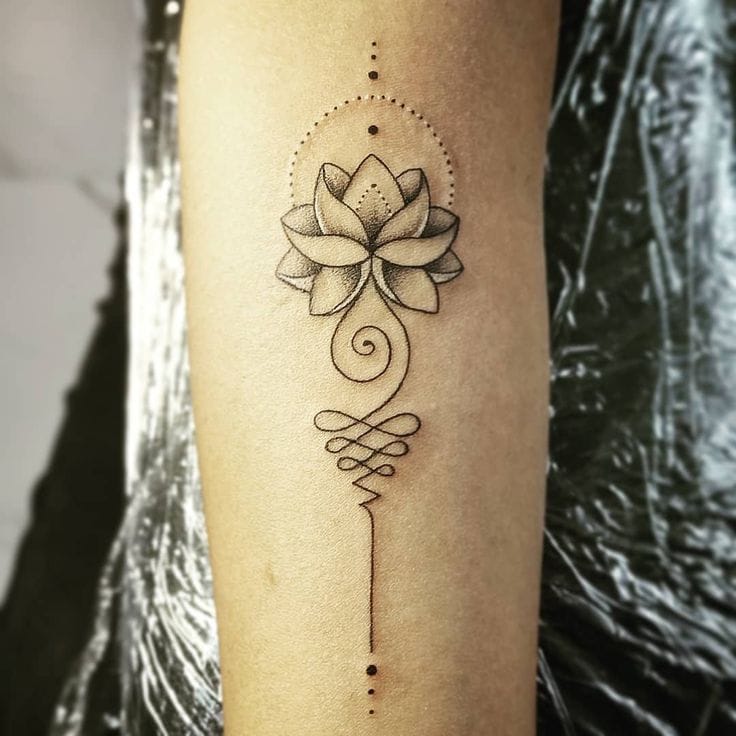 an Indian tattoo with a lotus flower