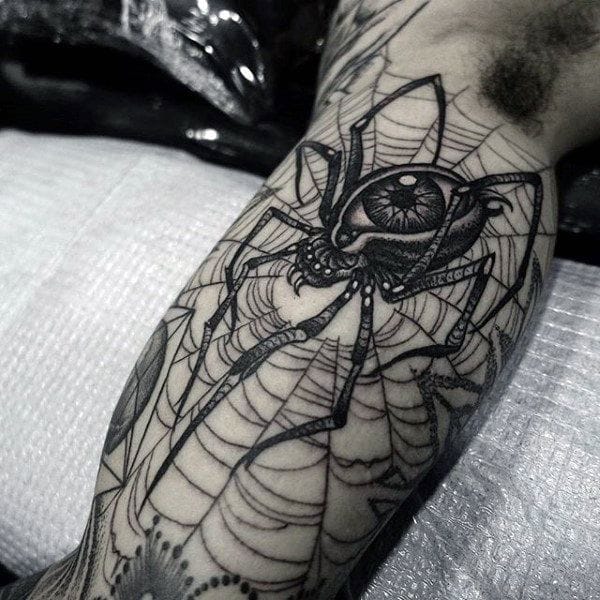 black and grey spider web tattoo