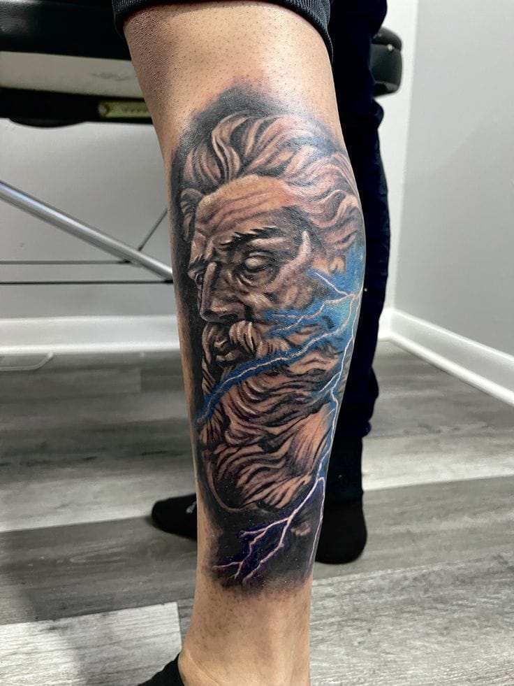 zeus and lightning leg tattoo