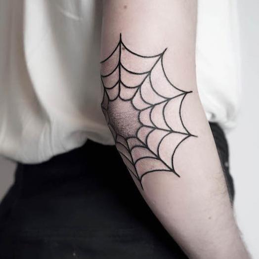 elbow web tattoo