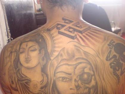 an Indian tattoo with a swastika symbol