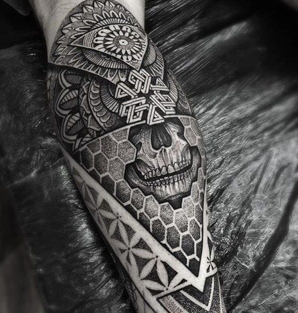 an Indian tattoo with a mandala pattern