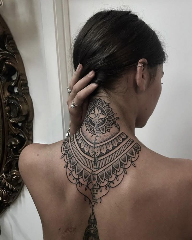 ornamental neck tattoo