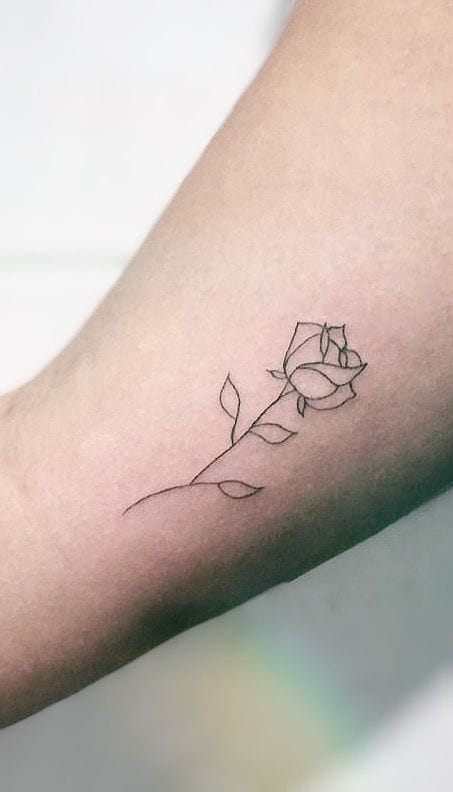 minimalist rose line tattoo