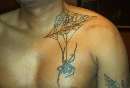 chest spider web tattoo
