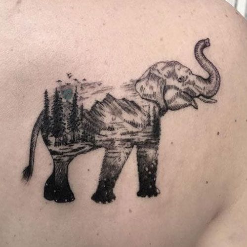 trunk up elephant tattoo