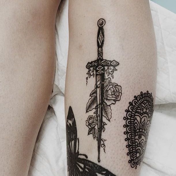 swords suit tattoo