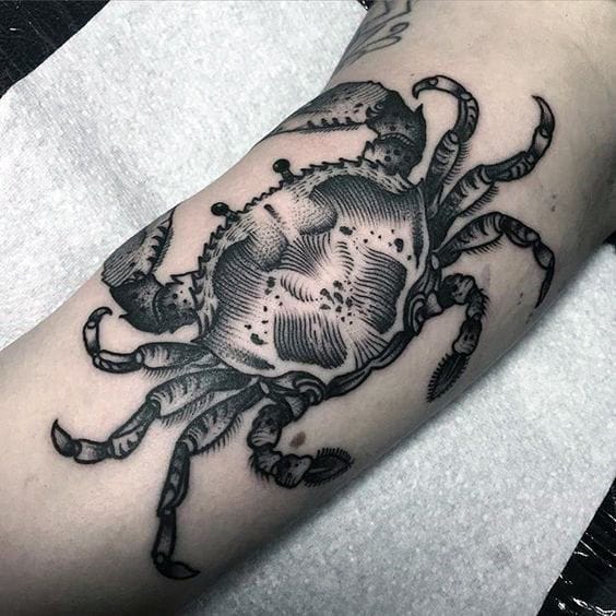 blackwork crab tattoo