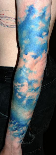 watercolor cloud sleeve tattoo