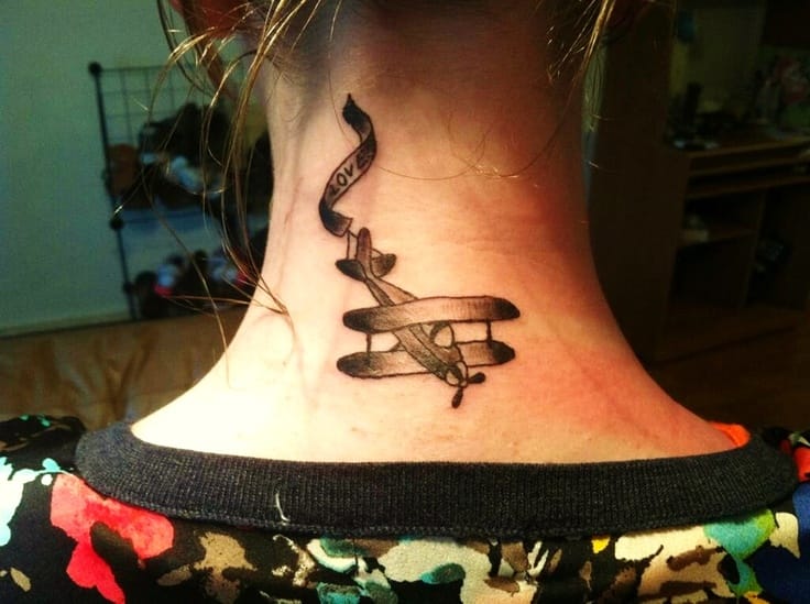 airplane with banner tattoo