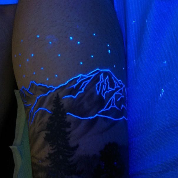 glow-in-the-dark forest tattoo