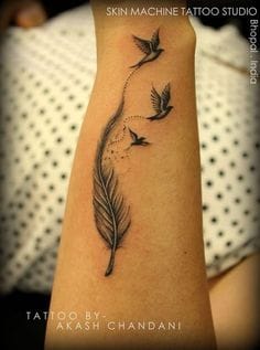 memorial feather tattoo