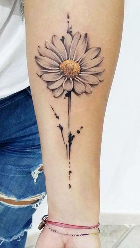 forearm daisy tattoo