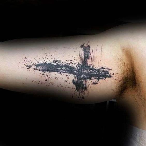 men's inner cross tattoo
