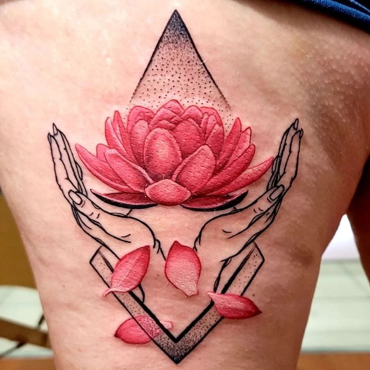 a small Japanese tattoo with lotus flower