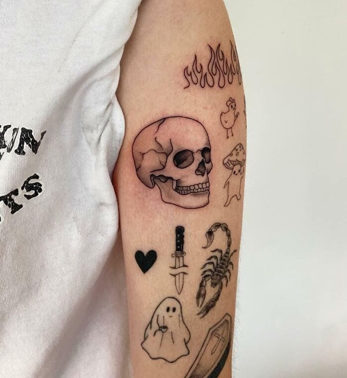 skull patchwork sleeve tattoo