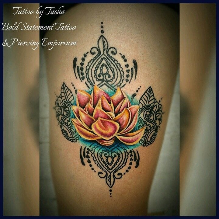 an Indian tattoo with a lotus mandala