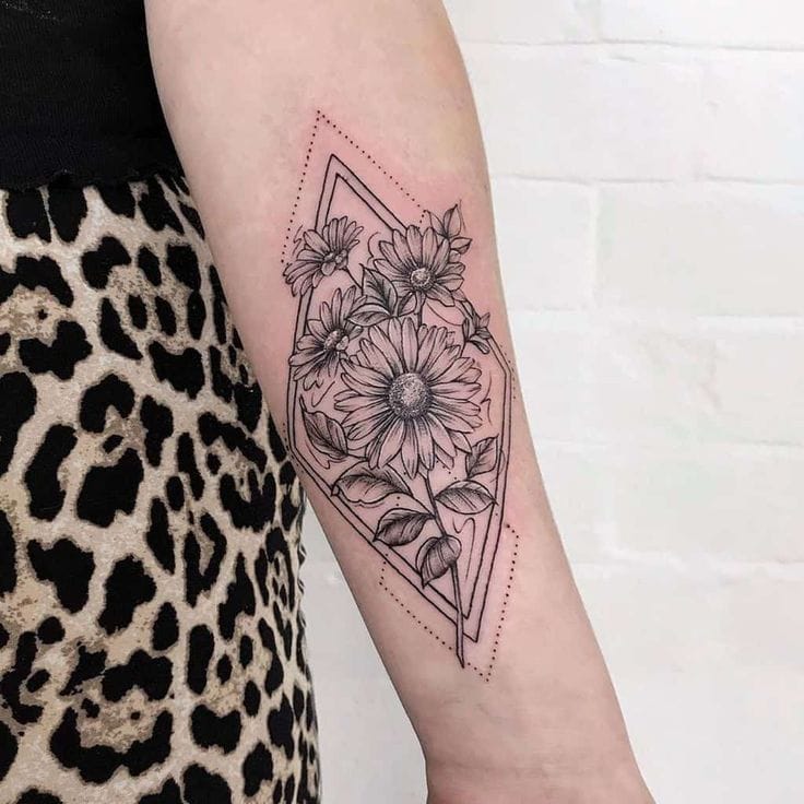 geometric daisy tattoo