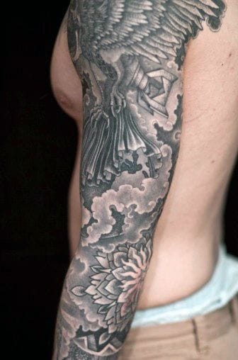dark art cloud sleeve tattoo
