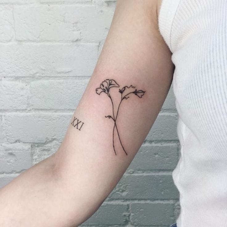 minimalist sweet pea tattoo