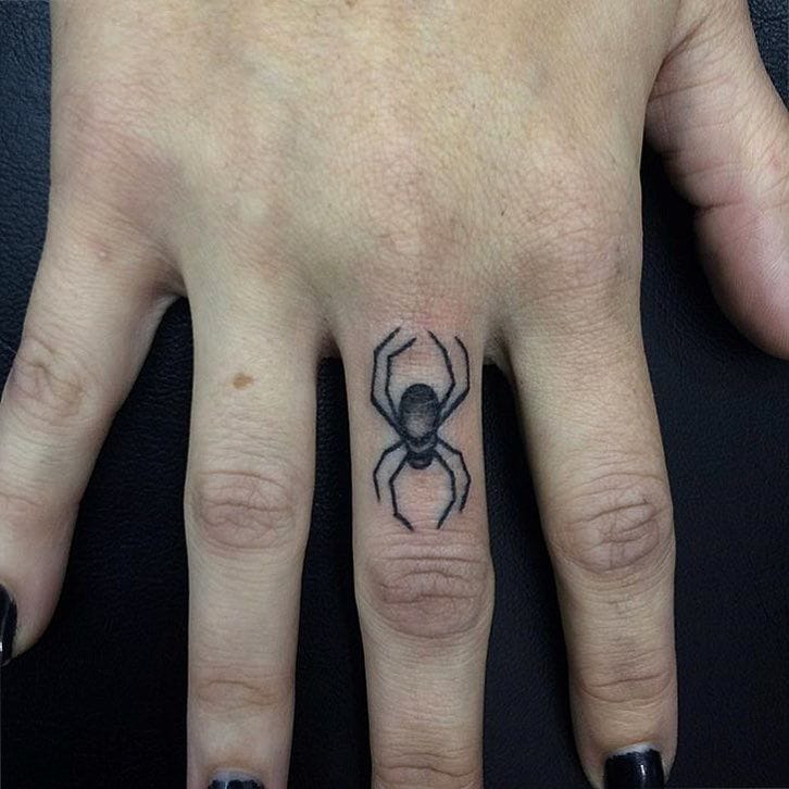 finger spider tattoo