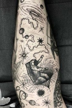 space patchwork sleeve tattoo