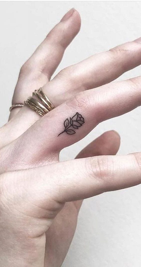 tiny finger rose tattoo