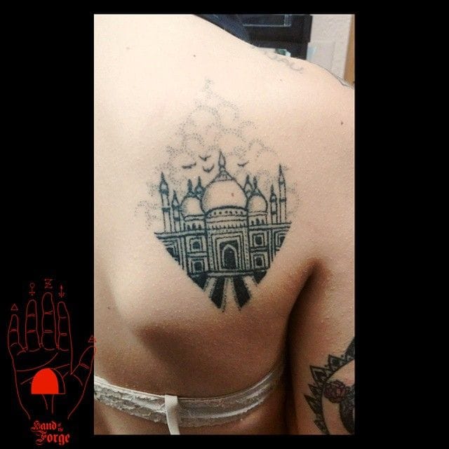 an Indian tattoo design with the Taj Mahal