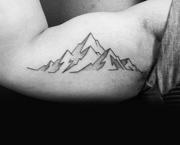 men's inner mountain tattoo