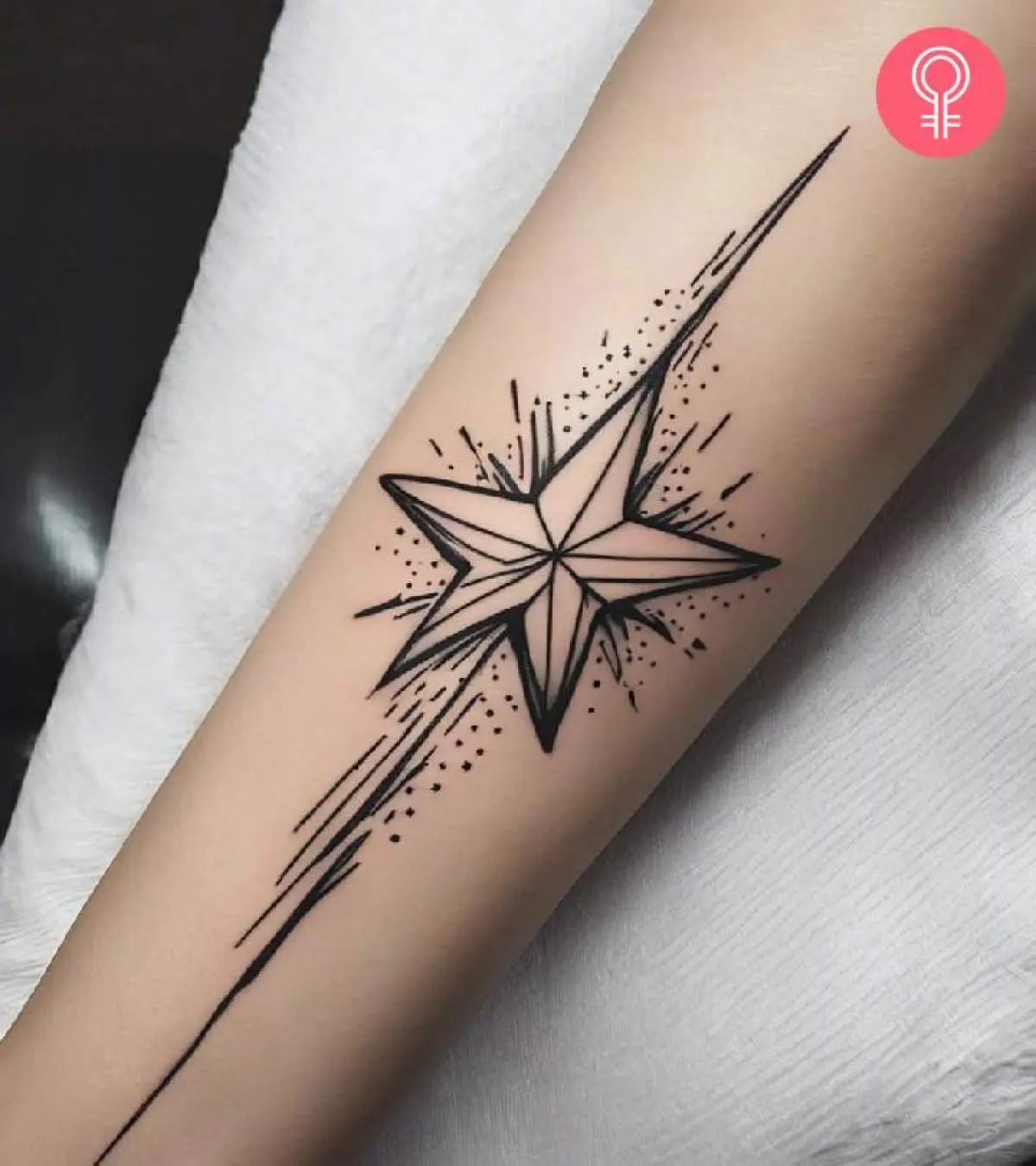 a beautiful shooting star tattoo with personal symbol