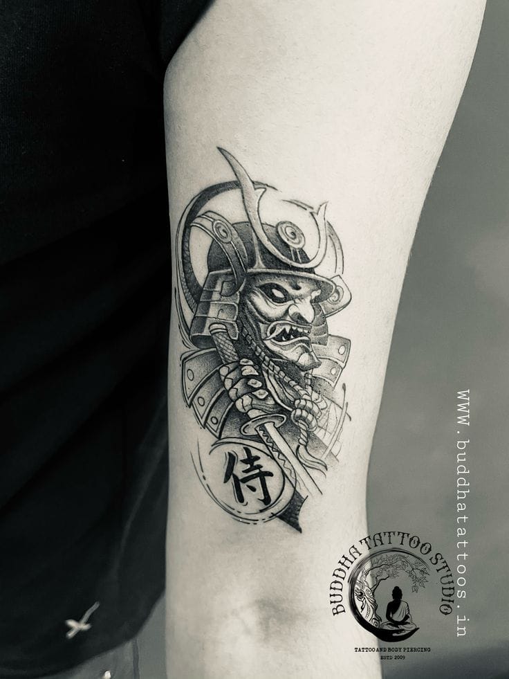 a small Japanese tattoo with a samurai helmet